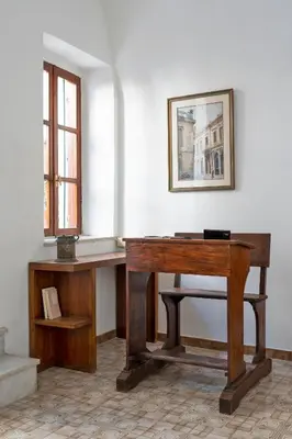 a wooden desk in a room with a window at Traditional 3 bedroom house in the Old Town in Rhodes Town