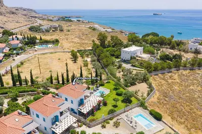 an aerial view of a house with a swimming pool at Villa Aqua Maris by Villa Plus in Líndos