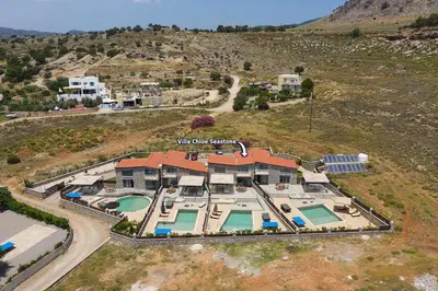 an aerial view of a house with a swimming pool at Villa Chloe Seastone by Villa Plus in Kiotari