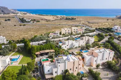 an aerial view of a villa with the ocean in the background at Villa Selini by Villa Plus in Pefki Rhodes