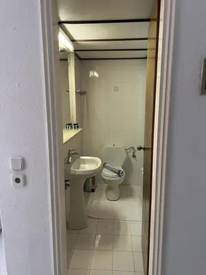 a bathroom with a toilet and a sink at Smart Accommodation Rhodes in Rhodes Town