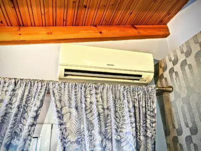 a air conditioner sitting on top of a ceiling at House with garden in city of Rhodes in Rhodes Town