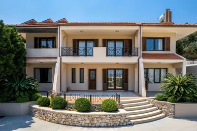 an exterior view of a house at 3 Roses Residence in Afantou