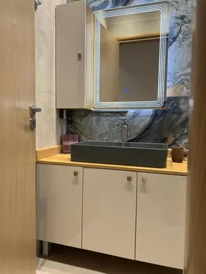 a kitchen with a sink and a mirror at Psaropoula's Hidden Gem in Rhodes Town