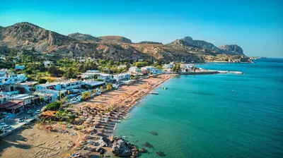 an aerial view of a beach with buildings and the ocean at Summer Paradise Stegna Rhodes in Archangelos