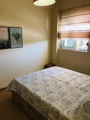 a bedroom with a large bed in a room at MATREL Home 2 in Rhodes Town