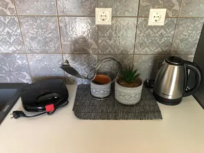 a kitchen counter with a coffee pot and a tea kettle at MATREL Home 2 in Rhodes Town