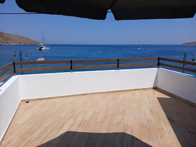 a view of the ocean from the deck of a boat at OASIS APARTMENTS in Livadia