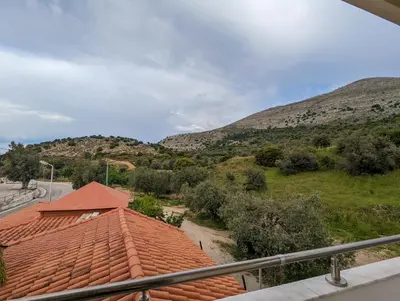 a view from a roof of a house with mountains in the background at Tharenos home in Émbonas