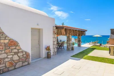 a villa with a view of the ocean at Anima Maris in Kiotari