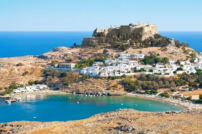 a small island with a castle on a hill at Villa Jimmy, Pilona Village in vlicha