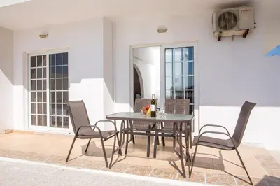 a dining room with a table and chairs at Anastasia Private Pool Apartment in Afantou