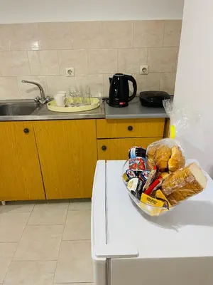 a bowl of food sitting on a table in a kitchen at Anastasia Apartment in Afantou