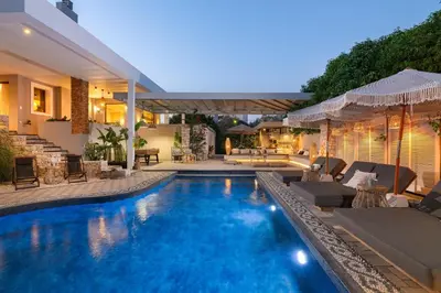 a swimming pool in the backyard of a house at Vento Imperiale Estate in Rhodes Town