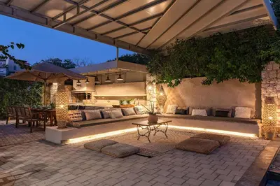 an outdoor patio with a couch and a table at Vento Imperiale Estate in Rhodes Town