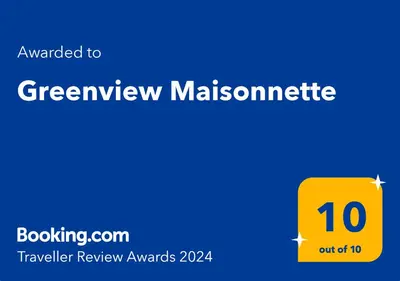 a yellow box with the words greenviewmalcolm at Greenview Maisonnette in Apóllona