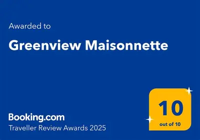 a yellow box with the words greenviewmalcolm at Greenview Maisonnette in Apóllona