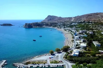 an aerial view of a beach in a bay at Stegna Rita's apartment in Archangelos