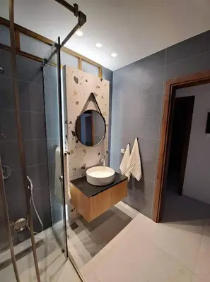 a bathroom with a sink and a mirror at Courtyard Luxury Suites “MARIANTHI” in Pefki Rhodes