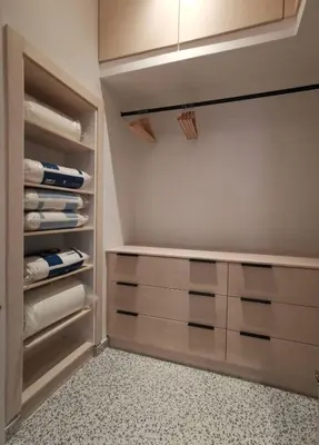 a walk in closet with drawers and cabinets at Casa Manny in Rhodes Town