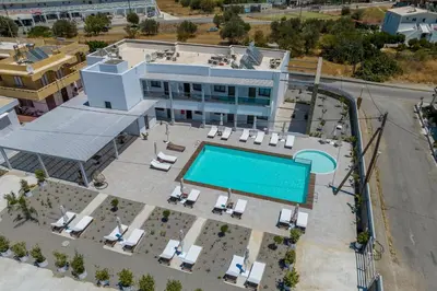 an aerial view of a hotel with a swimming pool at Kellys Luxury Apartments in Faliraki