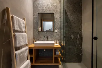 a bathroom with a sink and a shower at Villa Auretta in Pefki Rhodes