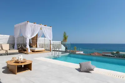 a pool on the roof of a house at Villa Auretta in Pefki Rhodes
