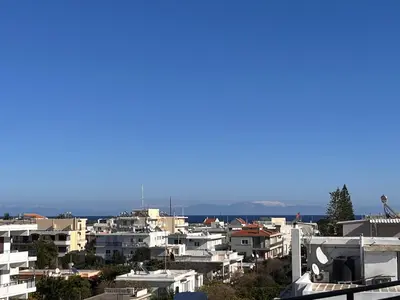 a view of a city with white buildings at Loft style apartment near the Old Town in Rhodes Town