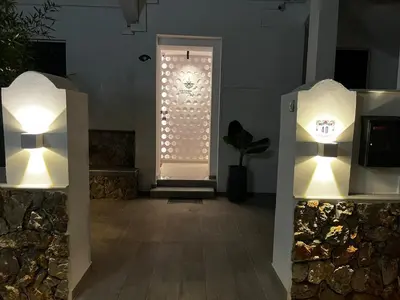 a room with a window with lights on it at City Compass Luxury Suites in Rhodes Town