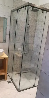 a shower with a glass door in a bathroom at Chrysanthi Villa, Living in Nature in vlicha