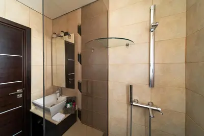 a bathroom with a sink and a shower at Ethereum Villa in Asgourou