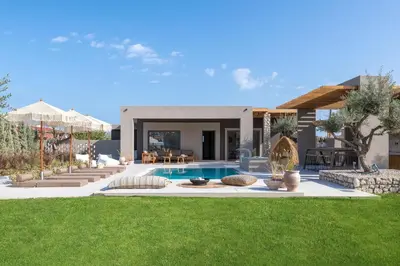 a house with a swimming pool in a yard at Mirena Luxury Living-Casa di Maria in Afantou