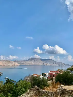 a view of a lake with mountains in the background at The Mill House Stella in Symi