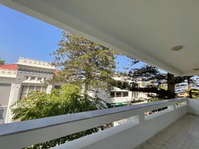 a balcony with a view of a building at MV central in Rhodes Town