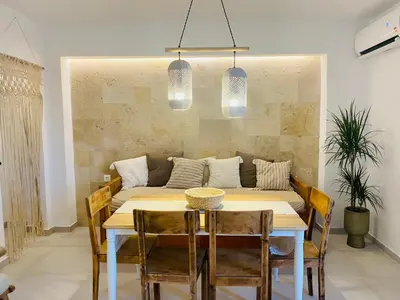 a dining room with a table and chairs at Nonna Cannella in Rhodes Town