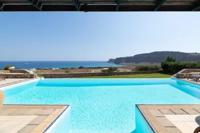 a swimming pool with a view of the ocean at Villa Athena with Private Pool and Seaview in Líndos