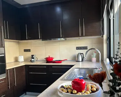 a kitchen with a sink and a bowl of food at Villa Chrysa Rhodes with Heated Pool in Afantou