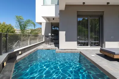 a swimming pool in the backyard of a house at ANIMA DEL SOL (BASILICO) in Ixia