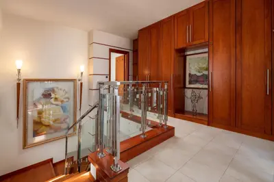 a hallway with a glass case in a room at Casa di Vasia in Gennadi