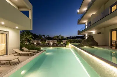 an image of a swimming pool in a house at Sun City Luxury Apartments in Rhodes Town