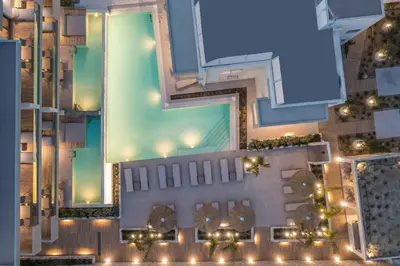 an overhead view of a building with a pool at Sun City Luxury Apartments in Rhodes Town