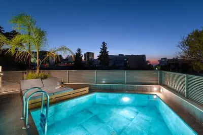 a swimming pool on the roof of a building at ANIMA DEL SOL ( LEVANTA ) in Ixia