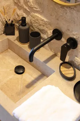 a sink with a faucet on a counter at EliteDIMension Chalki in Halki