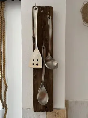 two spoons hangingrilyrilyrilyrilyrilyrilyrilyrilyrilyrilyrilyantly at ALONI G&A Archaggelos in Archangelos