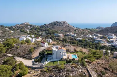 an aerial view of a villa on a hill at Villa Kamos in Archangelos