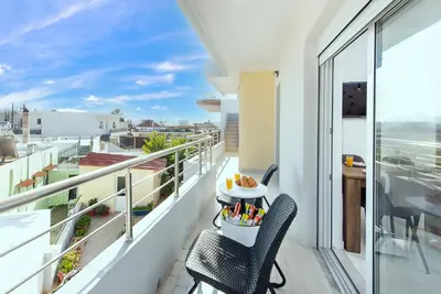 a balcony with a table and chairs and a view at Dolce Casa Suite1 in Afantou