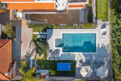 an overhead view of a swimming pool in a house at Emmelia Villa in Ialyssos