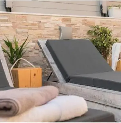a concrete table with avertisement for at Rhodes Center Luxurious Penthouse in Rhodes Town