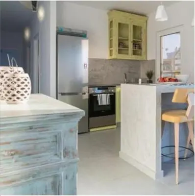 a kitchen with a counter and a stove top oven at Rhodes Center Luxurious Penthouse in Rhodes Town