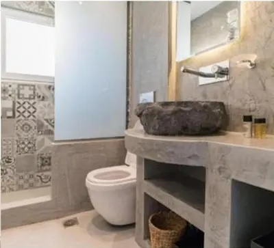 a bathroom with a toilet and a sink at Rhodes Center Luxurious Penthouse in Rhodes Town
